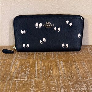 Coach Black Zip-Around Wallet with Eye Motif